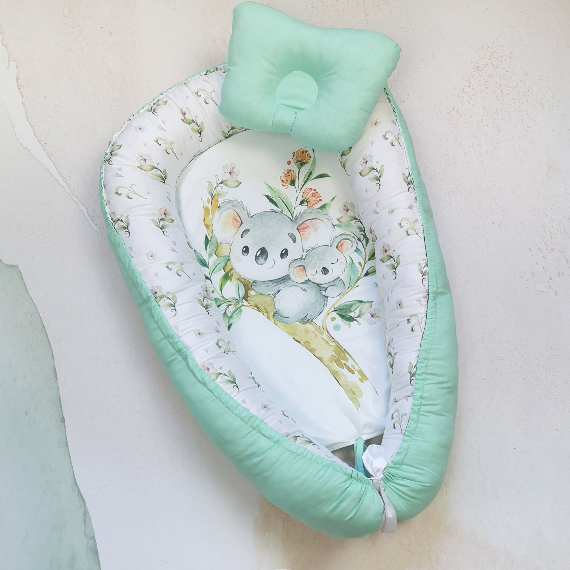 Гнездышко-кокон для новорожденного Kid Way Коалы 82х53 см мятный
Гнездышко-кокон для новорожденного Kid Way Коалы 82х53 см мятный