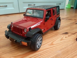 Машинка Bruder Позашляховик Jeep Wrangler Unlimited Rubicon Джип Ренглер Рубікон 02525 фото від покупців 1