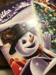 Шоколад Milka Адвент Календарь (Санта с санями) с 24 фигурками разных персонажей 200 г