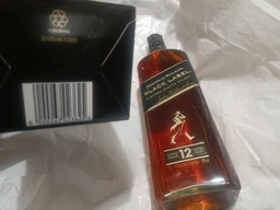 Виски Johnnie Walker Black label 12 лет выдержки 1 л 40% в подарочной упаковке (5000267023625) фото от покупателей 1