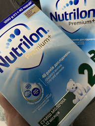 Молочная сухая смесь Nutrilon Premium+ 2 1 кг (5900852047213) фото от покупателей 12
