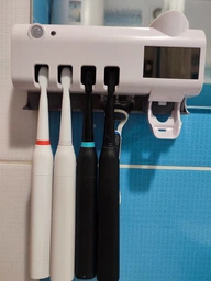 Настінний диспенсер для зубної пасти і стерилізатор для щіток Toothbrush sterilizer WJ3 фото від покупців 17