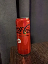 Упаковка безалкогольного напитка Coca-Cola ZERO 0.33 л х 12 банок (5449000131805) фото от покупателей 8