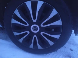 Автомобильные колпаки 4 Racing Avalon Carbon Silver-Black R14 4 шт (с логотипом Nissan)