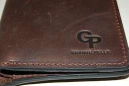 Шкіряне портмоне унісекс з накладною монетницею GRANDE PELLE 11224 Червоне фото від покупців 6