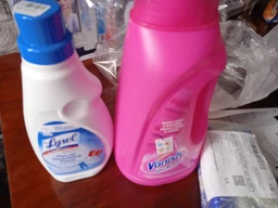 Пятновыводитель Vanish Oxi Action для белого 100 мл фото от покупателей 18