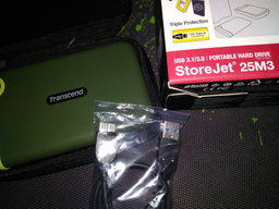 Жорсткий диск Transcend StoreJet 25M3G 2TB TS2TSJ25M3G 2.5" USB 3.1 Gen1 External Military Green фото від покупців 9