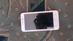 Мобільний телефон Alcatel One Touch Pop 3 5025D Dual SIM Metallic Silver фото від покупців 1