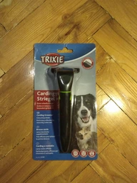 Расческа-триммер для собак Trixie для удаления подшерстка 6 х 15 см (4011905241838) фото от покупателей 4