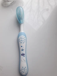 Зубная щетка Chicco First Milk Teeth для первых зубов 6-36 месяцев Голубая (12081.11) фото от покупателей 13