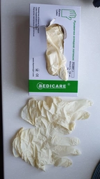 Перчатки латексные смотровые Medicare текстурированные неопудренные M 50 пар Белые (52-065) (4820118174457)