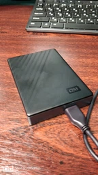 Портативний жорсткий диск WD My Passport 4TB (WDBPKJ0040BBK-WESN) фото від покупців 1