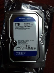 Накопитель HDD SATA 1.0TB WD Blue 5400rpm 64MB (WD10EZRZ) фото от покупателей 15