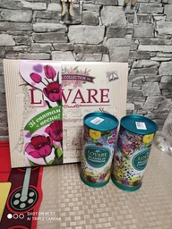 Купаж чорного та зеленого чаю Lovare Splashes Champagne з ягодами годжі тубус 80г фото від покупців 9