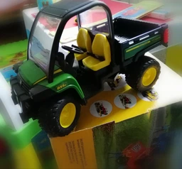 Машинка Bruder John Deere Gator XUV 855D 1:16, 02491 фото от покупателей 4