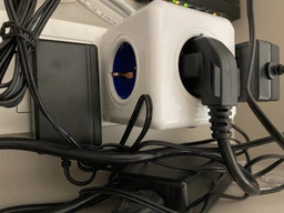 Мережевий розгалужувач Allocacoc Powercube На 5 розеток Сірий (1100GY/DEORP) фото від покупців 12
