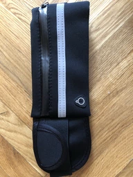 Сумка для бега Спортивная сумка на пояс 20 х 10 х 2 см RunningBag Влагостойкая Black (HK050301) фото от покупателей 1