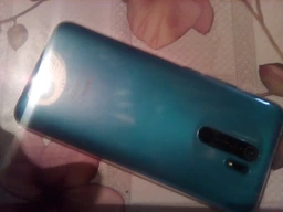 Мобильный телефон Xiaomi Redmi 9 4/64GB Ocean Green (657897) фото от покупателей 1
