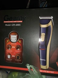 Беспроводная аккумуляторная машинка для стрижки волос Geemy GM-6005 триммер для волос, бороды и усов фото от покупателей 17