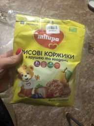 Рисовые коржики Milupa с грушей и ягодами для питания детей от 7-ми месяцев 40 г (8720097005291) фото от покупателей 6