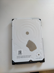 Жорсткий диск Western Digital Blue 2TB 5400rpm 128MB WD20SPZX 2.5" SATA III фото від покупців 19