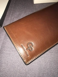 Вертикальне шкіряне портмоне унісекс GRANDE PELLE 11556 Синій фото від покупців 1