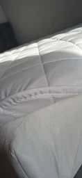 Наматрасник Sleepingg 180х200 см Защитный стёганый антиаллергенный с резинками по углам, микрофибра, белый (4820227285372) фото от покупателей 1