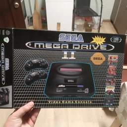 Ігрова ретро приставка телевізійна консоль 16 біт Sega-MD2 з підтримкою картриджів та 9 вбудованих ігор фото від покупців 1