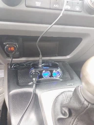 Автомобільний розгалужувач прикурювача YANTU 3 в 1 + USB 12/24 вольт Type B фото від покупців 1