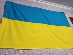 Флаг Украины из габардина, национальный флаг Украины с размерами 90см х 135см наружный, цвета синий и жёлтый фото от покупателей 12