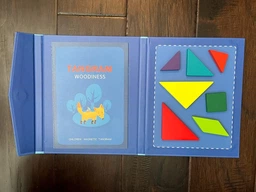 Танграм (Tangram) Дерев’яна головоломка в магнітний папці Woodiness фото від покупців 7
