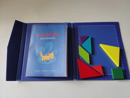 Танграм (Tangram) Дерев’яна головоломка в магнітний папці Woodiness фото від покупців 3
