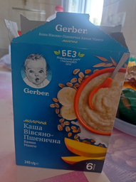 Дитяча каша Gerber Суха молочна швидкорозчинна Вівсяно-пшенична Банан-Манго для дітей з 6 місяців 240 г (7613039834053) фото від покупців 12