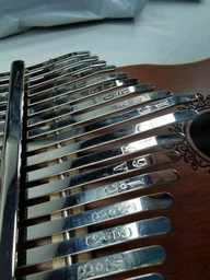 Калимба Enfuntins с 17 клавишами Пальчиковое пианино Kalimba (ENK17BR) фото от покупателей 3