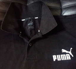 Поло длинное мужское Puma Ess Pique 586674-01 M Черное (4063697400696) фото от покупателей 3