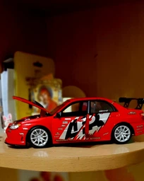Машина Welly, Subaru Impreza Performance, метал., масштаб 1:24 (22487S-W) фото від покупців 1