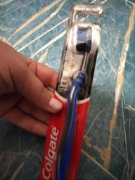 Зубная щетка Colgate Зиг Заг Древесный уголь Средней жесткости Оранжевая (2170000000121) фото от покупателей 7