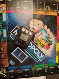 Настільна гра Монополія/Monopoly від HASBRO з електроним банкінгом Українська версія фото від покупців 1