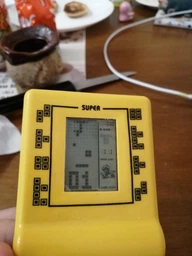 Тетріс Brick Game E-9999 in 1 (чорний) фото від покупців 9