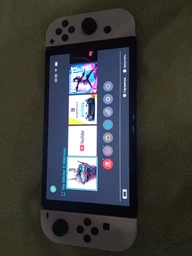 Nintendo Switch (OLED model) White фото от покупателей 1