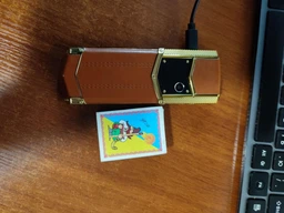 Смартфон H-Mobile V1 (Hope V1) brown-gold. Vertu design фото від покупців 1