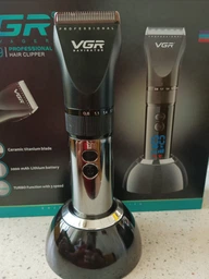 Професійна бездротова машинка для стрижки волосся на підставці VGR V-049 зі змінними насадками 3-12 мм фото від покупців 2