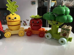 Конструктор LEGO DUPLO Трактор для вирощування фруктів та овочів 19 деталей (10982) фото від покупців 1