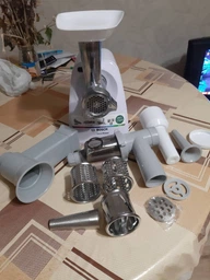 Мясорубка Bosch MFW2517W с насадкой соковыжималкой фото от покупателей 13