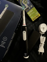 Электрическая зубная щетка Oral-B (Pro1 Black) фото от покупателей 9