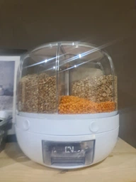 Обертовий контейнер для круп та бобових. Диспенсер для сипучих продуктів