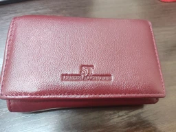 Кожаный женский горизонтальный кошелек с монетницей ST Leather бордового цвета (bg224fash89)