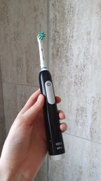 Электрическая зубная щетка Oral-B (Pro1 Black) фото от покупателей 7