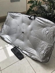 Автомобільна сонцезахисна парасолька на лобове скло 135×79 см UV, складна, чорно-сіра XJ5106 фото від покупців 19