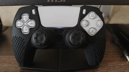 Силіконовий чохол для джойстика PS5 Dualsense камуфляжний (чорно-синій) + в подарунок накладки на стіки фото від покупців 7
